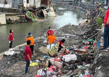 Bantu Pemulihan Pasca Banjir, Bersihkan Sungai dan Beri Bantuan Kemanusiaan di Bali
