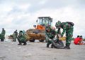 Karya Bakti Terpadu Ribuan Personel Bersatu Menjaga Kebersihan Pantai Bali